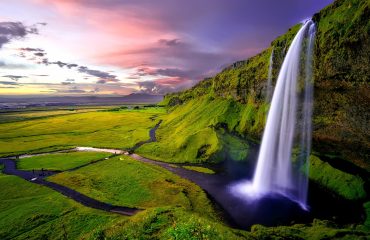 time lapse photography of waterfalls during sunset