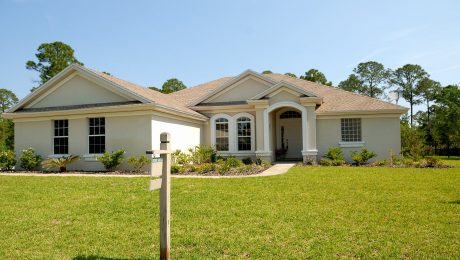pexels-photo-210617 white and brown concrete bungalow under clear blue sky